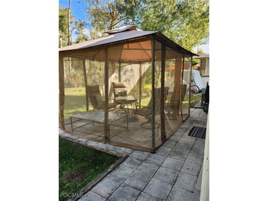 Gorgeous, spaceous manufactured home in Corkscrew Woodlands an on Copperleaf Golf Club in Florida - for sale on GolfHomes.com, golf home, golf lot