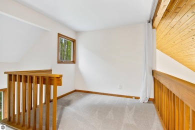 Enjoy a peaceful, wooded retreat. This charming property offers on Black Forest At Wilderness Valley in Michigan - for sale on GolfHomes.com, golf home, golf lot