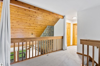 Enjoy a peaceful, wooded retreat. This charming property offers on Black Forest At Wilderness Valley in Michigan - for sale on GolfHomes.com, golf home, golf lot