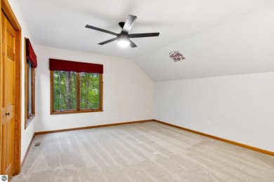 Enjoy a peaceful, wooded retreat. This charming property offers on Black Forest At Wilderness Valley in Michigan - for sale on GolfHomes.com, golf home, golf lot