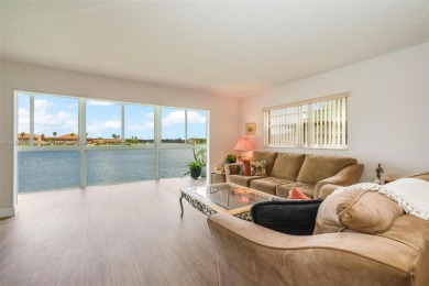 WOW! ** CENTER LAKE CORNER UNIT **( 1,533 sq ft,  shows larger on Flamingo Lakes Country Club in Florida - for sale on GolfHomes.com, golf home, golf lot