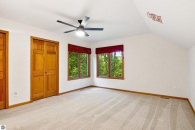 Enjoy a peaceful, wooded retreat. This charming property offers on Black Forest At Wilderness Valley in Michigan - for sale on GolfHomes.com, golf home, golf lot