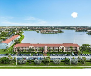 WOW! ** CENTER LAKE CORNER UNIT **( 1,533 sq ft,  shows larger on Flamingo Lakes Country Club in Florida - for sale on GolfHomes.com, golf home, golf lot