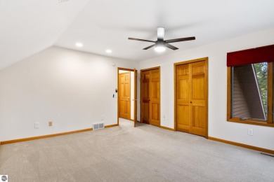 Enjoy a peaceful, wooded retreat. This charming property offers on Black Forest At Wilderness Valley in Michigan - for sale on GolfHomes.com, golf home, golf lot