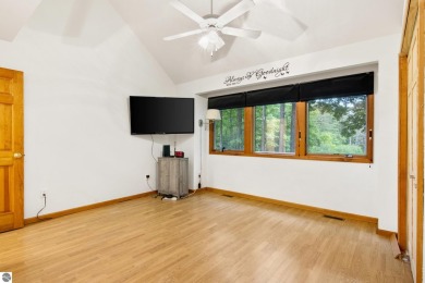 Enjoy a peaceful, wooded retreat. This charming property offers on Black Forest At Wilderness Valley in Michigan - for sale on GolfHomes.com, golf home, golf lot