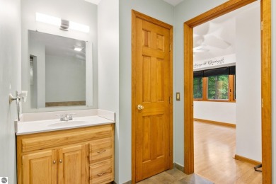 Enjoy a peaceful, wooded retreat. This charming property offers on Black Forest At Wilderness Valley in Michigan - for sale on GolfHomes.com, golf home, golf lot