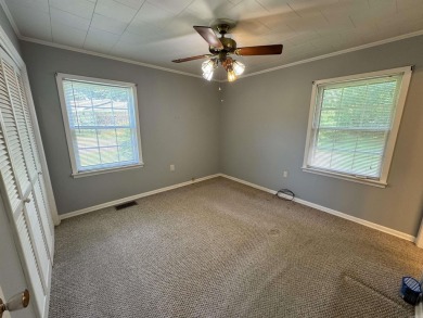 937 Homecrest Drive in Piggott, AR is a 3 BR, 2 BA, 1,742 SF on Sugar Creek Country Club in Arkansas - for sale on GolfHomes.com, golf home, golf lot