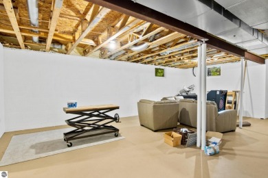 Enjoy a peaceful, wooded retreat. This charming property offers on Black Forest At Wilderness Valley in Michigan - for sale on GolfHomes.com, golf home, golf lot