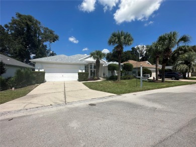 Brand New Roof and Recently Reduced Price! This highly on Royal Oaks Golf Club in Florida - for sale on GolfHomes.com, golf home, golf lot