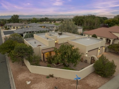 This perfectly placed adobe style home is right at the steps of on Tiara Rado Golf Course in Colorado - for sale on GolfHomes.com, golf home, golf lot