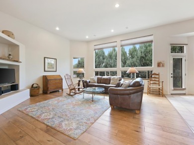 This perfectly placed adobe style home is right at the steps of on Tiara Rado Golf Course in Colorado - for sale on GolfHomes.com, golf home, golf lot