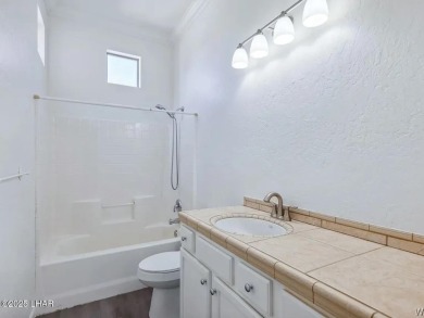 Experience the perfect blend of modern comfort and resort-style on Laughlin Ranch Golf Club in Arizona - for sale on GolfHomes.com, golf home, golf lot