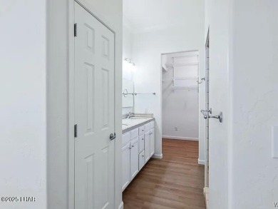 Experience the perfect blend of modern comfort and resort-style on Laughlin Ranch Golf Club in Arizona - for sale on GolfHomes.com, golf home, golf lot