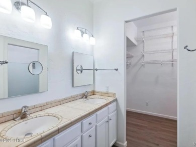 Experience the perfect blend of modern comfort and resort-style on Laughlin Ranch Golf Club in Arizona - for sale on GolfHomes.com, golf home, golf lot