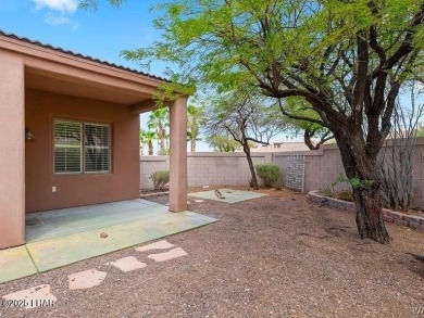 Experience the perfect blend of modern comfort and resort-style on Laughlin Ranch Golf Club in Arizona - for sale on GolfHomes.com, golf home, golf lot