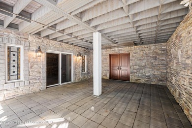 Welcome to this architecturally striking Tudor-inspired on Glenmaura National Golf Club in Pennsylvania - for sale on GolfHomes.com, golf home, golf lot
