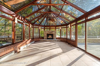 Welcome to this architecturally striking Tudor-inspired on Glenmaura National Golf Club in Pennsylvania - for sale on GolfHomes.com, golf home, golf lot
