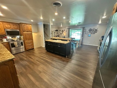 This One-of-a-kind, split level home features 4 beds, and 2 full on Borger Country Club in Texas - for sale on GolfHomes.com, golf home, golf lot