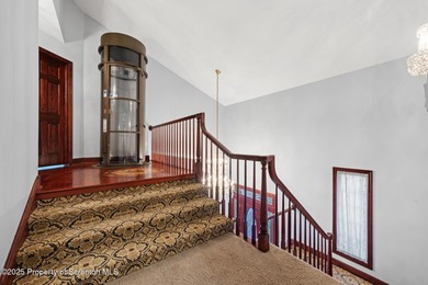 Welcome to this architecturally striking Tudor-inspired on Glenmaura National Golf Club in Pennsylvania - for sale on GolfHomes.com, golf home, golf lot