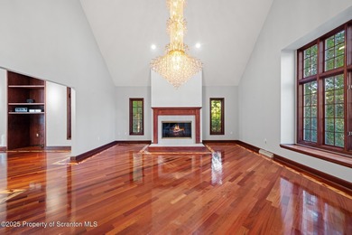 Welcome to this architecturally striking Tudor-inspired on Glenmaura National Golf Club in Pennsylvania - for sale on GolfHomes.com, golf home, golf lot
