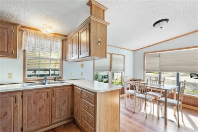 American Condominium - Your Perfect Winter Retreat or Forever on The Links of Lake Bernadette in Florida - for sale on GolfHomes.com, golf home, golf lot