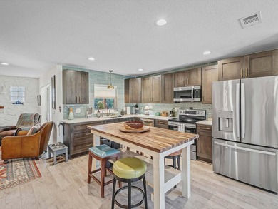 This 1,532 sq ft 3 bed 2 bath 2+ car garage CBS home sits on an on The Saints At Port St Lucie Golf Course in Florida - for sale on GolfHomes.com, golf home, golf lot