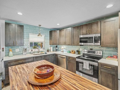 This 1,532 sq ft 3 bed 2 bath 2+ car garage CBS home sits on an on The Saints At Port St Lucie Golf Course in Florida - for sale on GolfHomes.com, golf home, golf lot