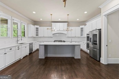 This magnificent home seamlessly blends modern design with on Hamilton Mill Golf Club in Georgia - for sale on GolfHomes.com, golf home, golf lot