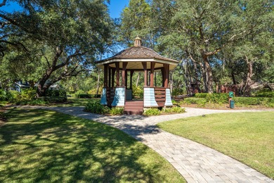 Build your dream home on this 0.26-acre waterview lot located on on Sharks Tooth Golf Club in Florida - for sale on GolfHomes.com, golf home, golf lot