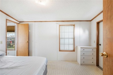 American Condominium - Your Perfect Winter Retreat or Forever on The Links of Lake Bernadette in Florida - for sale on GolfHomes.com, golf home, golf lot