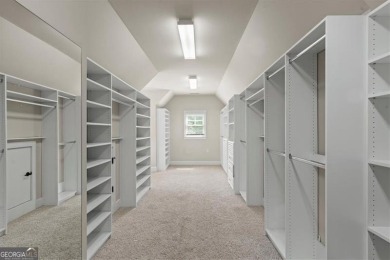 This magnificent home seamlessly blends modern design with on Hamilton Mill Golf Club in Georgia - for sale on GolfHomes.com, golf home, golf lot
