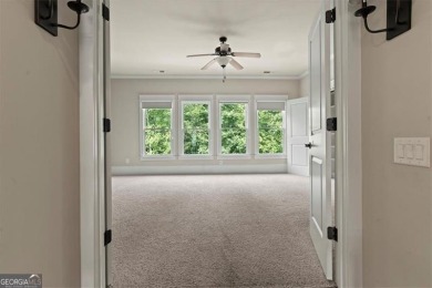 This magnificent home seamlessly blends modern design with on Hamilton Mill Golf Club in Georgia - for sale on GolfHomes.com, golf home, golf lot