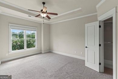 This magnificent home seamlessly blends modern design with on Hamilton Mill Golf Club in Georgia - for sale on GolfHomes.com, golf home, golf lot