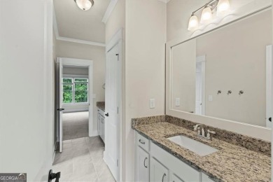 This magnificent home seamlessly blends modern design with on Hamilton Mill Golf Club in Georgia - for sale on GolfHomes.com, golf home, golf lot