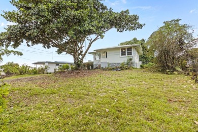 Welcome home to 217 Haihai Street-an inviting three-bedroom, two on Hilo Municipal Golf Course in Hawaii - for sale on GolfHomes.com, golf home, golf lot