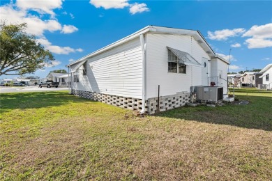 American Condominium - Your Perfect Winter Retreat or Forever on The Links of Lake Bernadette in Florida - for sale on GolfHomes.com, golf home, golf lot