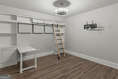This magnificent home seamlessly blends modern design with on Hamilton Mill Golf Club in Georgia - for sale on GolfHomes.com, golf home, golf lot