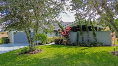 AMAZING! IMPRESSIVE 3/2.5/2.5 GOLF FRONT, POOL HOME IN DESIRABLE on St. Lucie Trail Golf Club in Florida - for sale on GolfHomes.com, golf home, golf lot