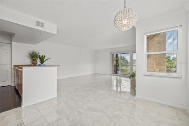 Under contract-accepting backup offers. One or more photo(s) has on Feather Sound Country Club in Florida - for sale on GolfHomes.com, golf home, golf lot