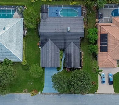 AMAZING! IMPRESSIVE 3/2.5/2.5 GOLF FRONT, POOL HOME IN DESIRABLE on St. Lucie Trail Golf Club in Florida - for sale on GolfHomes.com, golf home, golf lot