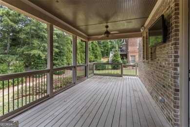 This magnificent home seamlessly blends modern design with on Hamilton Mill Golf Club in Georgia - for sale on GolfHomes.com, golf home, golf lot