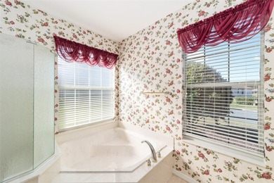 Introducing a spacious Kingston model now available in on Eagle Ridge At Spruce Creek Country Club in Florida - for sale on GolfHomes.com, golf home, golf lot