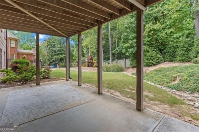 This magnificent home seamlessly blends modern design with on Hamilton Mill Golf Club in Georgia - for sale on GolfHomes.com, golf home, golf lot