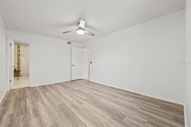 Under contract-accepting backup offers. One or more photo(s) has on Feather Sound Country Club in Florida - for sale on GolfHomes.com, golf home, golf lot