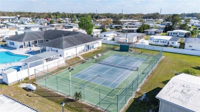 American Condominium - Your Perfect Winter Retreat or Forever on The Links of Lake Bernadette in Florida - for sale on GolfHomes.com, golf home, golf lot