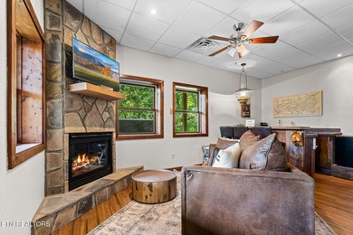 This beautifully designed 3-bedroom, 2.5-bath cabin, featuring a on Bent Creek Golf Course in Tennessee - for sale on GolfHomes.com, golf home, golf lot