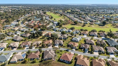Introducing a spacious Kingston model now available in on Eagle Ridge At Spruce Creek Country Club in Florida - for sale on GolfHomes.com, golf home, golf lot
