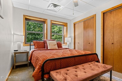 This beautifully designed 3-bedroom, 2.5-bath cabin, featuring a on Bent Creek Golf Course in Tennessee - for sale on GolfHomes.com, golf home, golf lot