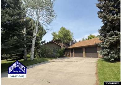 This place offers the Riverton golf course as your back yard! on Riverton Country Club in Wyoming - for sale on GolfHomes.com, golf home, golf lot