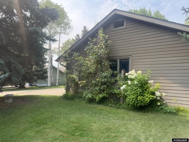 This place offers the Riverton golf course as your back yard! on Riverton Country Club in Wyoming - for sale on GolfHomes.com, golf home, golf lot